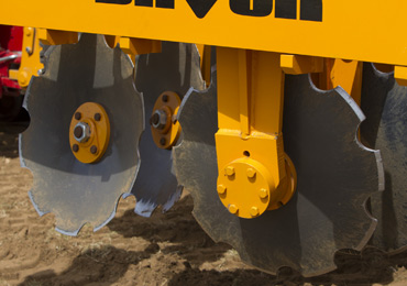 Close up photo of the heavy duty working discs on a Brock SuperTill 530